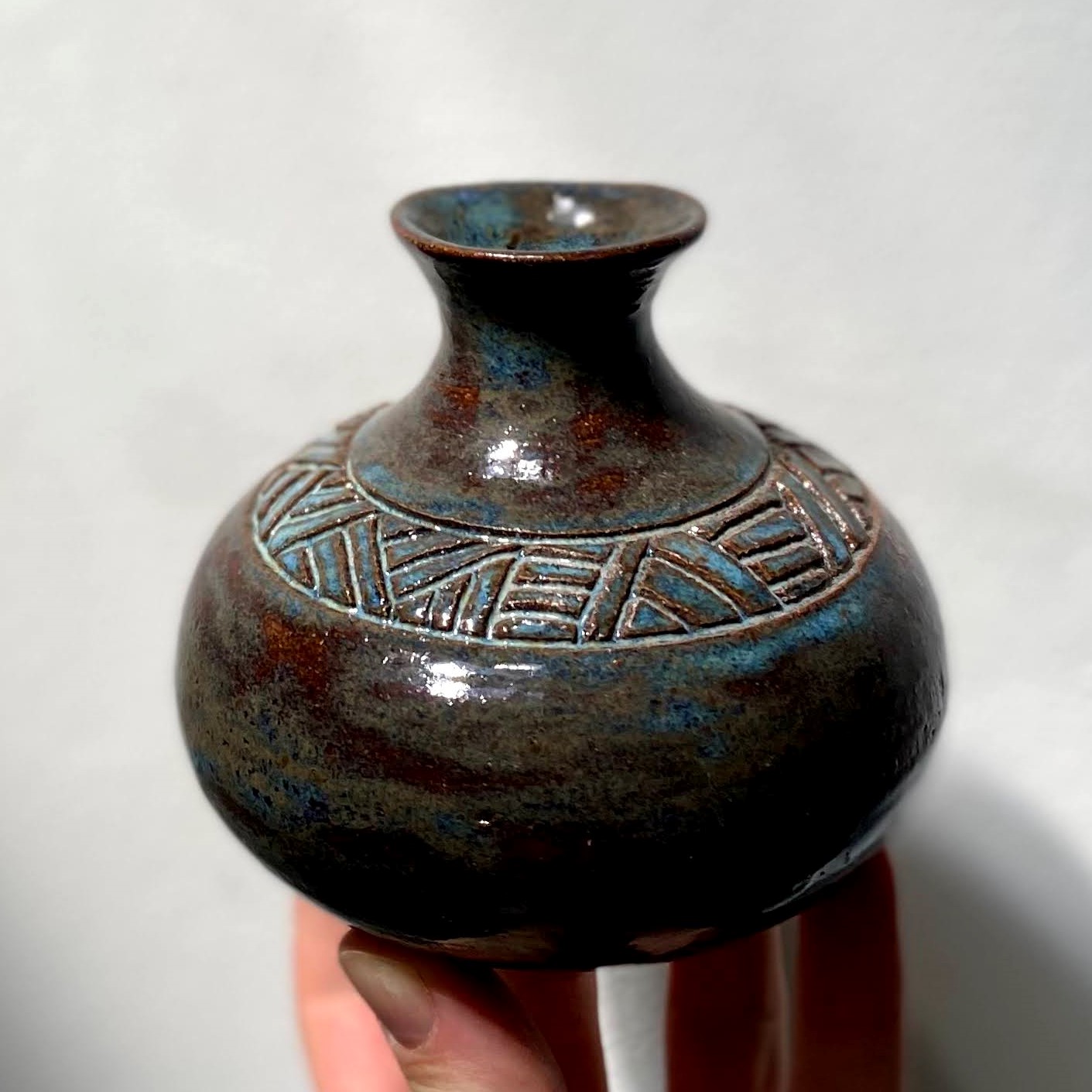 Small carved vase, blue rutile