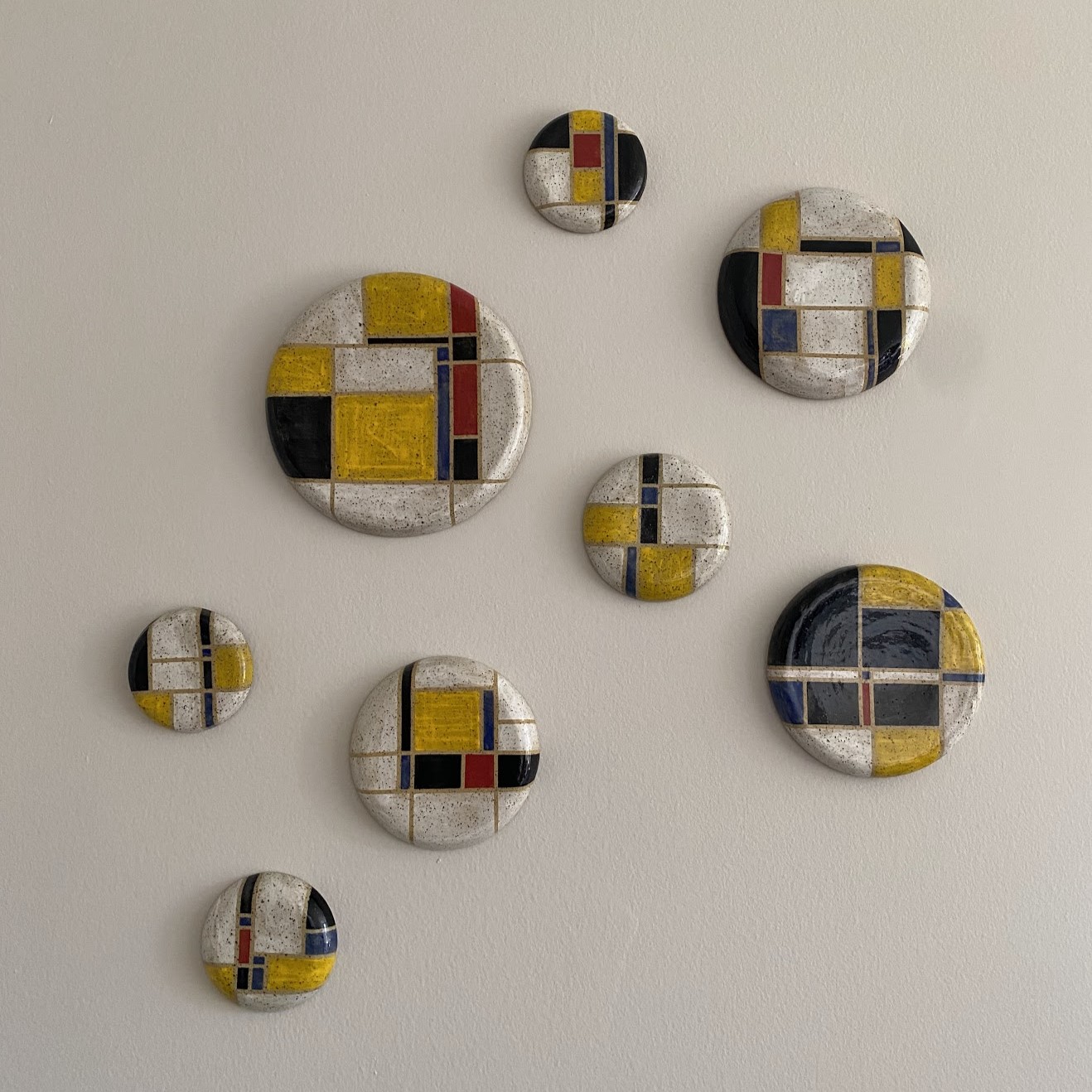 Mondrian-inspired ceramic plate wall art