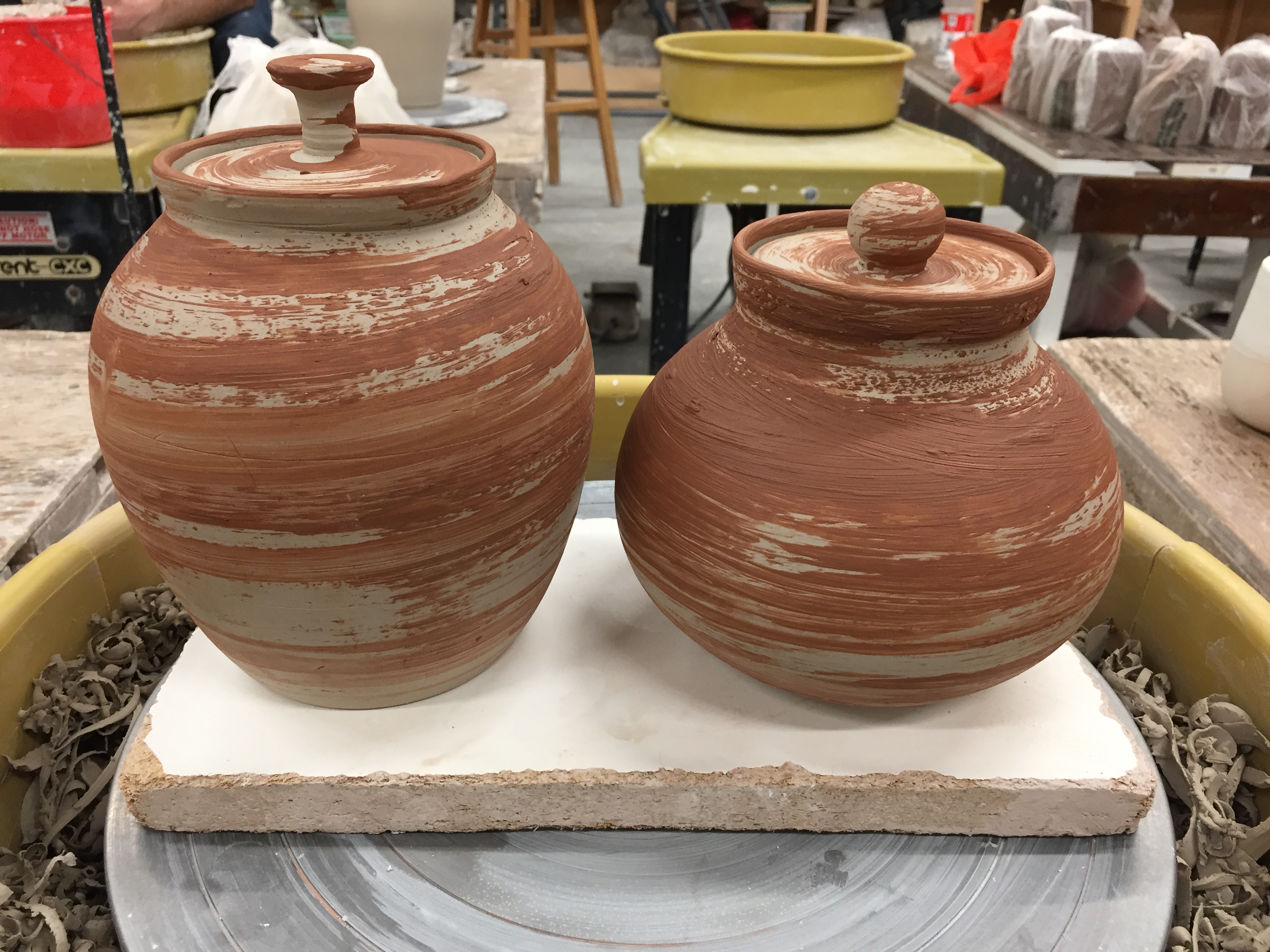 Lidded jars ready to be bisque fired